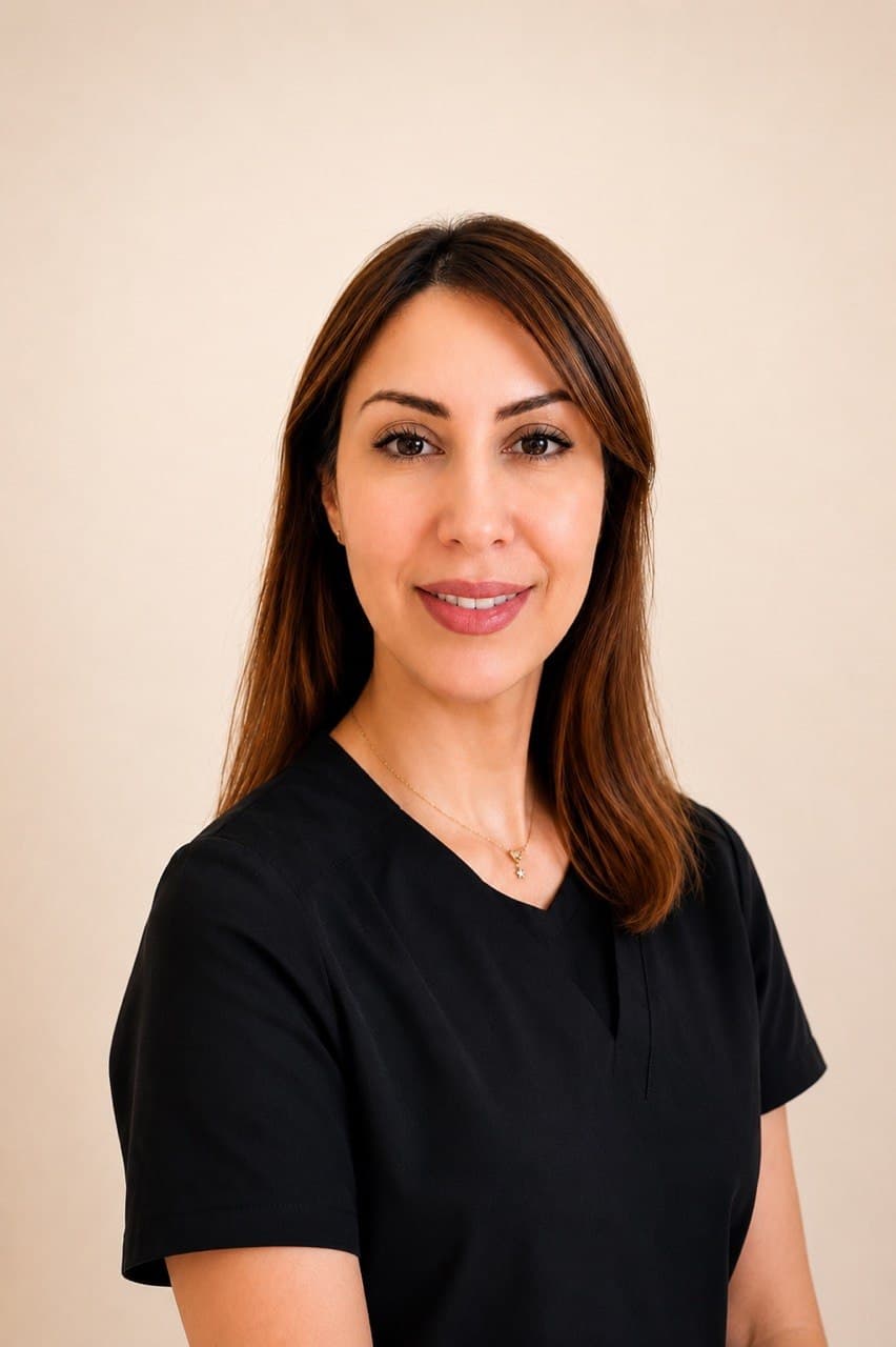 Mona conducting an aesthetic consultation at Mona Aesthetics clinic in Central Leeds